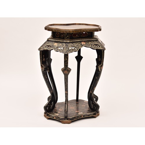 48 - A large Japanese black lacquer jardiniere stand, the top deorated with an extensive mountainous lans... 