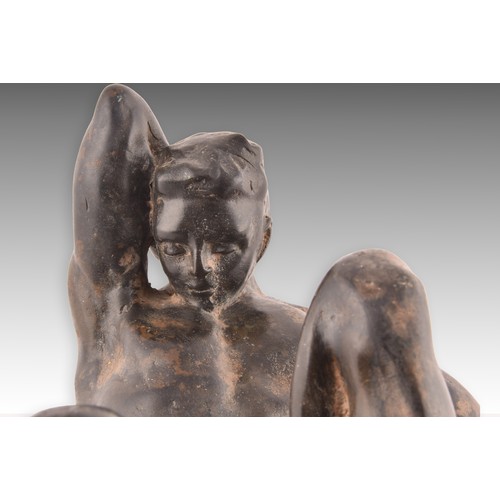 240 - Manner of Pierre Chenet (20th century, French)a patinated bronze figure of a seated nude man, his ar... 