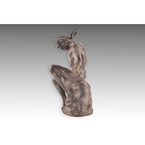 240 - Manner of Pierre Chenet (20th century, French)a patinated bronze figure of a seated nude man, his ar... 