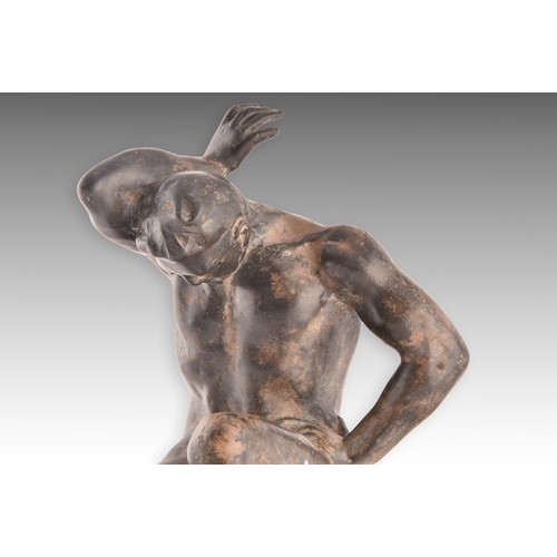 240 - Manner of Pierre Chenet (20th century, French)a patinated bronze figure of a seated nude man, his ar... 