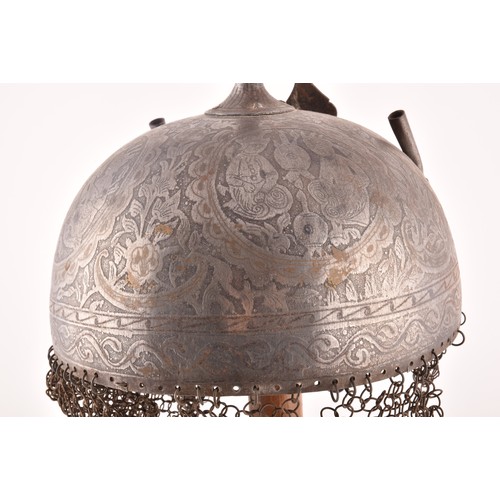 298 - A 19th century Persian kulah khud helmet, decorated over entire surface with figures and floral patt... 