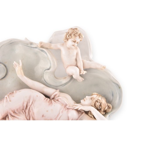 263 - A 19th century German porcelain figural group bowl, depicting a reclining woman and cherub, numbered... 