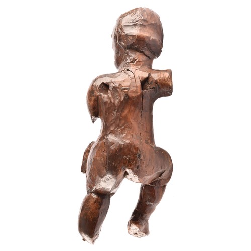 243 - A 19th century Italian carved fruit wood sculpture of a cherub, in tradition pose, with one leg rais... 