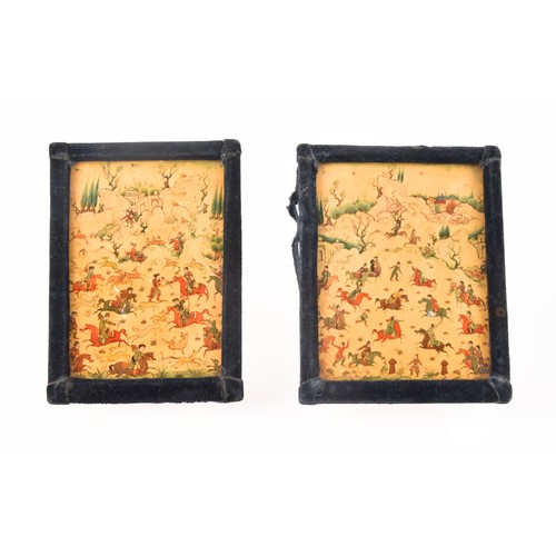 24 - A pair of 19th century Persian hand painted miniature paintings, depicting mounted warriors during a... 