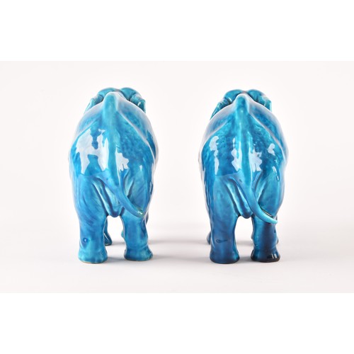 268 - Paul Milet (French, 1870-1950), a pair of French Sevres turquoise glazed ceramic elephants, 15.5 x 1... 