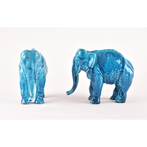 268 - Paul Milet (French, 1870-1950), a pair of French Sevres turquoise glazed ceramic elephants, 15.5 x 1... 