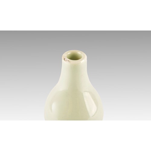 7 - A Chinese celadon glazed porcelain vase, the top of gourd shape, with rounded square section lower h... 