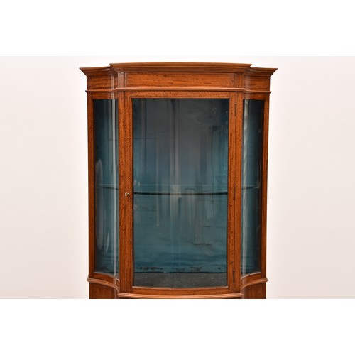 280 - An Edwardian Sheraton revival satinwood display cabinet, single door, 165 x 65 cm.