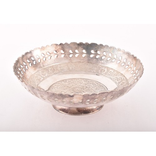 180 - A white metal bowl with pierced and floral design, unmarked, engraved to base, 19.5 x 19.5 cm, 8.4 o... 