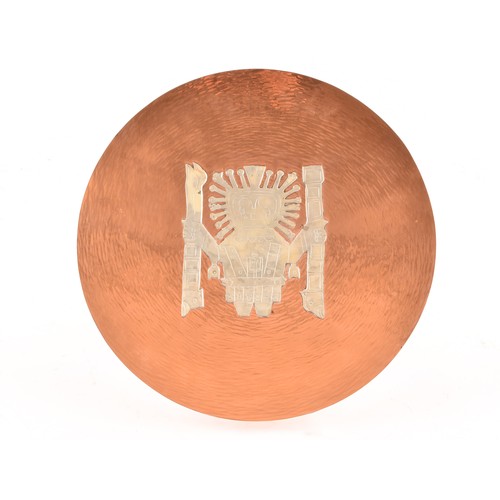 252 - A 20th century copper wall plate with applied silver Aztec design, 25 x 25 cm, together with a small... 