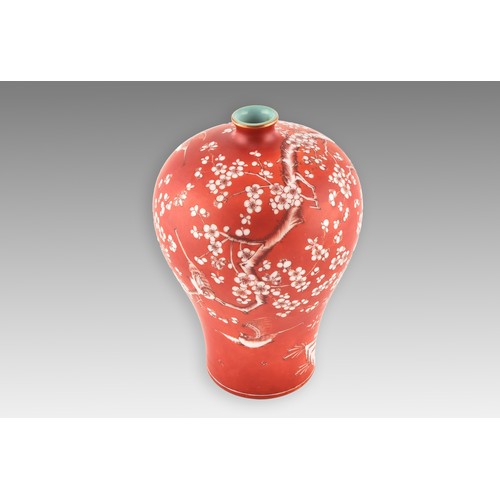 14 - A Chinese porcelain red ground blossom vase, with narrow turquoise glazed neck, the body painted wit... 