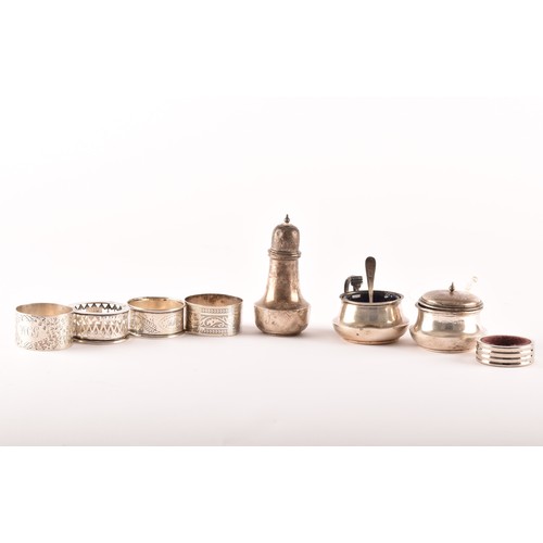 181 - A collection of silver napkin rings and silver cruet sets from various dates and makers, 4.8 ozt / 1... 