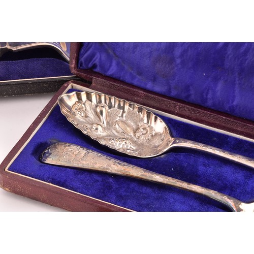 184 - A group of silver items to include two condiment sets, two ladles, a tea strainer, a trinket box, a ... 