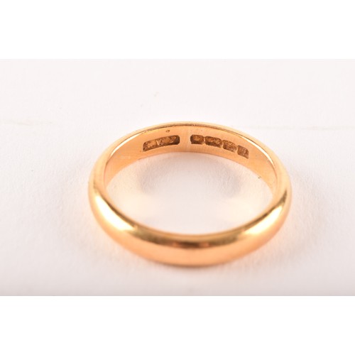 77 - A 22ct yellow gold wedding band, full hallmarks for Birmingham 1933 by EWP, size P 1/2, 6.1 grams.