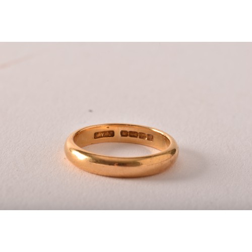 77 - A 22ct yellow gold wedding band, full hallmarks for Birmingham 1933 by EWP, size P 1/2, 6.1 grams.