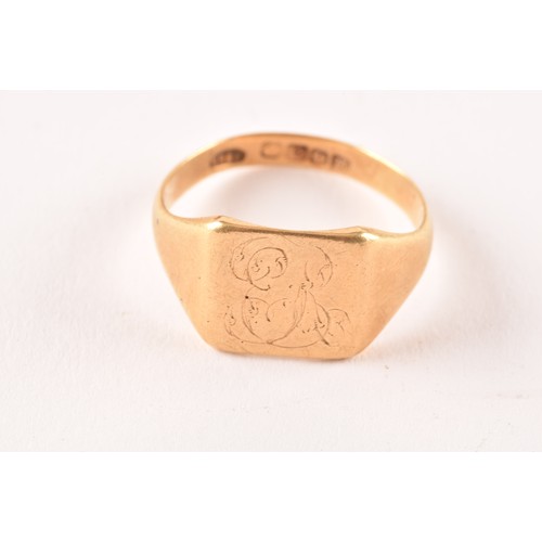 101 - A 18ct yellow gold signet ring, with full hallmarks for Birmingham 1936 by H Huntley & Sons, ini... 