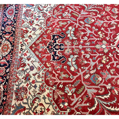 281 - A very large Persian Tabriz wool carpet featuring a large central medallion with detailed floral pat... 