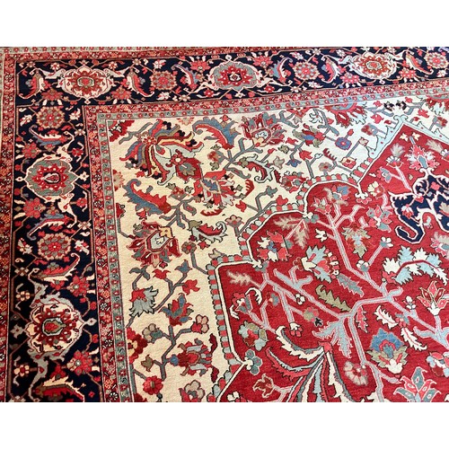 281 - A very large Persian Tabriz wool carpet featuring a large central medallion with detailed floral pat... 