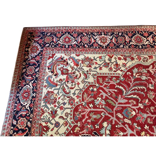 281 - A very large Persian Tabriz wool carpet featuring a large central medallion with detailed floral pat... 