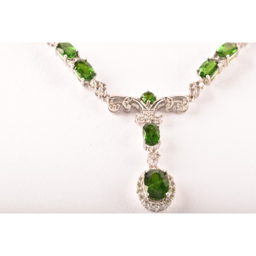 104 - A group of silver and chrome diopside jewellery, including a silver and chrome diopside drop pendant... 