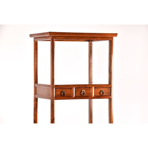 50 - A large Chinese hardwood three tier whatnot, each level inset with three small drawers, the base wit... 