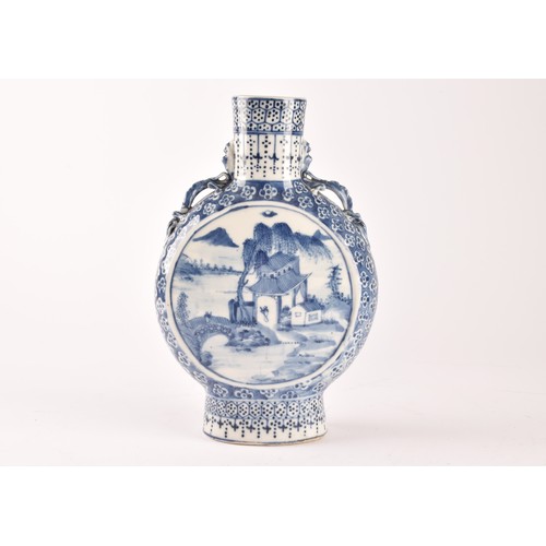 5 - A Chinese blue and white moon flask, with twin dragon handles, the body painted with a scene of figu... 