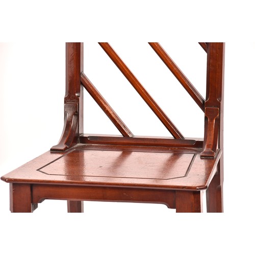 285 - A pair of Victorian mahogany Gothic style hall chairs, the backs with diagonal rails and turned fini... 