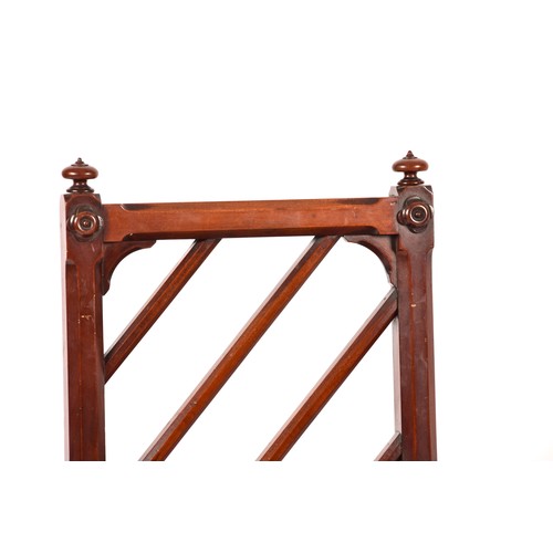 285 - A pair of Victorian mahogany Gothic style hall chairs, the backs with diagonal rails and turned fini... 