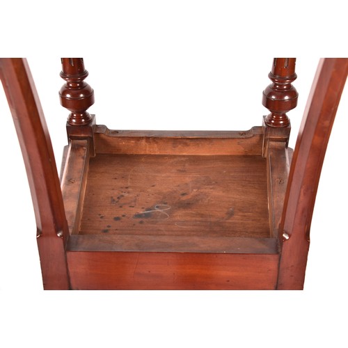 285 - A pair of Victorian mahogany Gothic style hall chairs, the backs with diagonal rails and turned fini... 