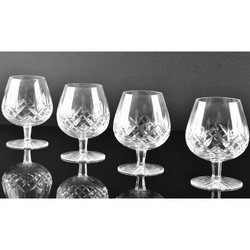 274 - A collection of Waterford cut crystal glasses, including six wine glasses, six champagne flutes, fou... 