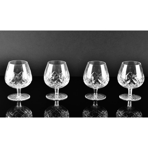 274 - A collection of Waterford cut crystal glasses, including six wine glasses, six champagne flutes, fou... 