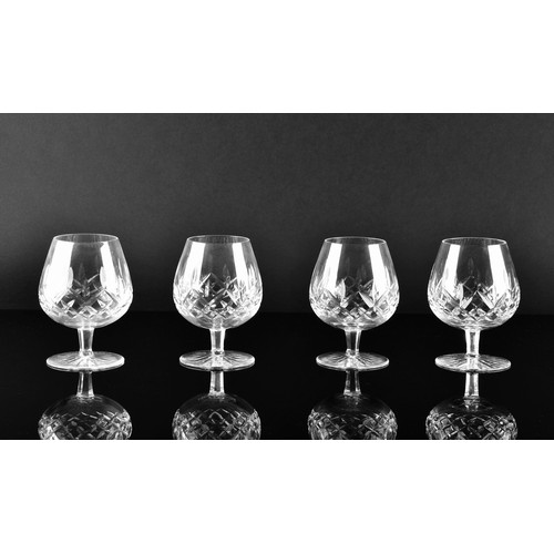 274 - A collection of Waterford cut crystal glasses, including six wine glasses, six champagne flutes, fou... 