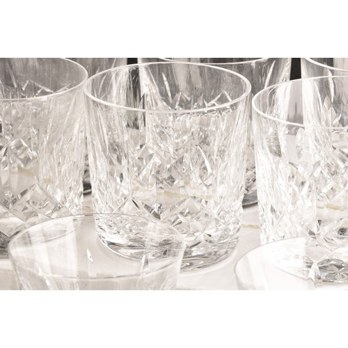 274 - A collection of Waterford cut crystal glasses, including six wine glasses, six champagne flutes, fou... 