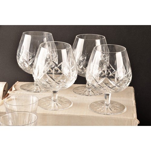 274 - A collection of Waterford cut crystal glasses, including six wine glasses, six champagne flutes, fou... 