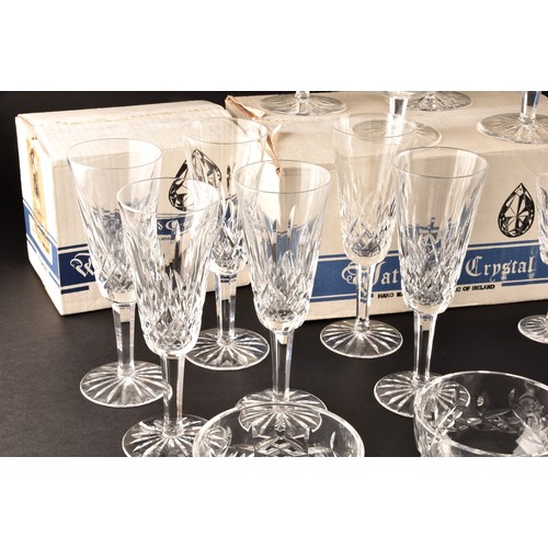 274 - A collection of Waterford cut crystal glasses, including six wine glasses, six champagne flutes, fou... 