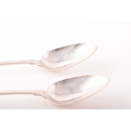 194 - A pair of Irish silver table spoons, hallmarked for Dublin 1833 by James Le Bas, crest engraved, fid... 