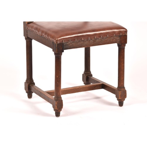 287 - A set of ten Jacobean revival oak and leather dining chairs, with leather studded back rests and sea... 