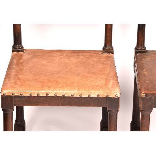 287 - A set of ten Jacobean revival oak and leather dining chairs, with leather studded back rests and sea... 