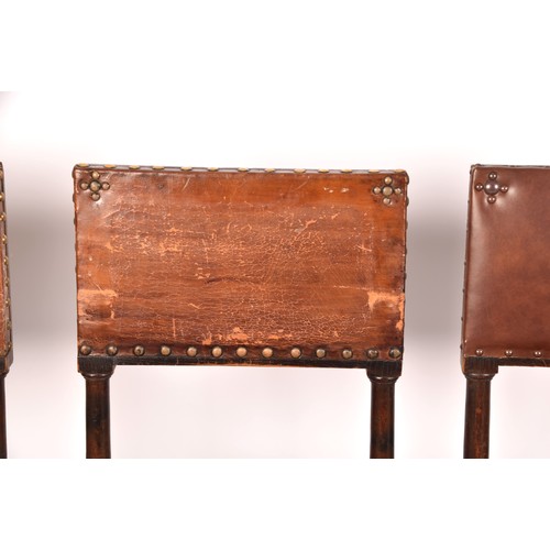 287 - A set of ten Jacobean revival oak and leather dining chairs, with leather studded back rests and sea... 