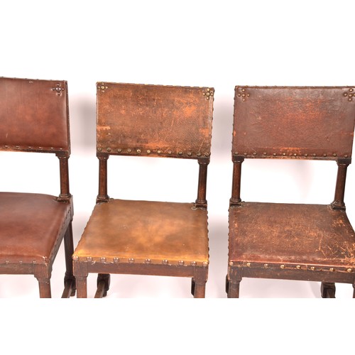 287 - A set of ten Jacobean revival oak and leather dining chairs, with leather studded back rests and sea... 