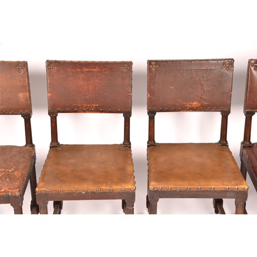 287 - A set of ten Jacobean revival oak and leather dining chairs, with leather studded back rests and sea... 