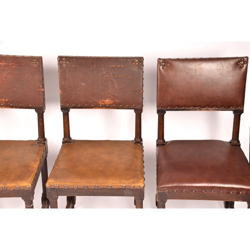 287 - A set of ten Jacobean revival oak and leather dining chairs, with leather studded back rests and sea... 