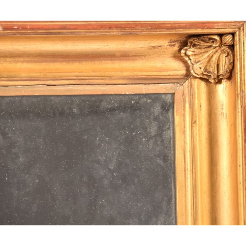 292 - A 19th century gilt framed rectangular wall mirror, the gilt gesso frame with shell mounted corners.... 