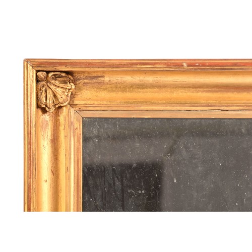 292 - A 19th century gilt framed rectangular wall mirror, the gilt gesso frame with shell mounted corners.... 