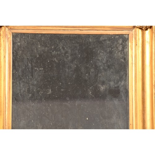 292 - A 19th century gilt framed rectangular wall mirror, the gilt gesso frame with shell mounted corners.... 