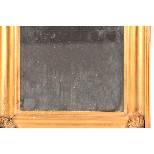 292 - A 19th century gilt framed rectangular wall mirror, the gilt gesso frame with shell mounted corners.... 