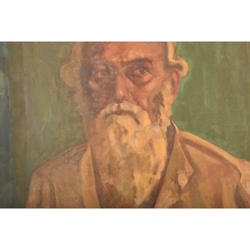 62 - Sawlaram Haldankar (Indian, 1882-1968)a portrait of an Indian bearded man, on a green ground, oil on... 