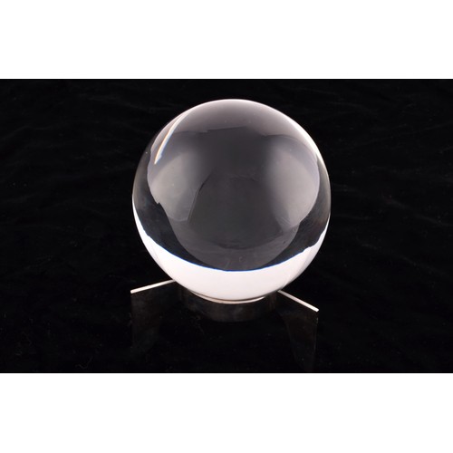 275 - Asprey crystal ball with stand, accompanied by black velvet blanket, ball measures 10cm.