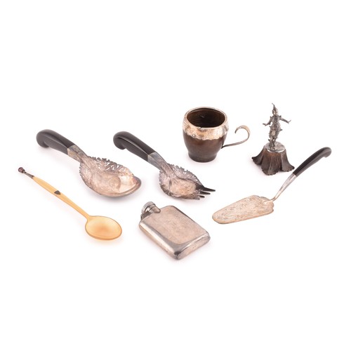 202 - A group of silver items, to include a hip flask, Malaysian silver and horn handled serving spoon, fo... 