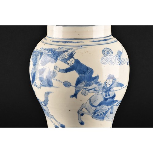 1 - A large Chinese Kangxi blue and white baluster vase, decorated with scenes of warriors and figures o... 